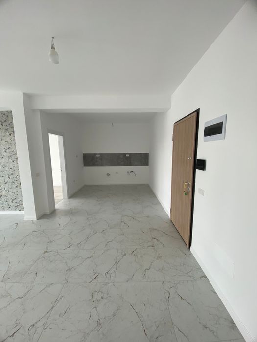 Apartament cu 3 camere+ loc de parcare.