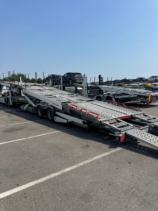 Transport autoturisme microbuze dube utilaje Italia  Romania și Romania Italia