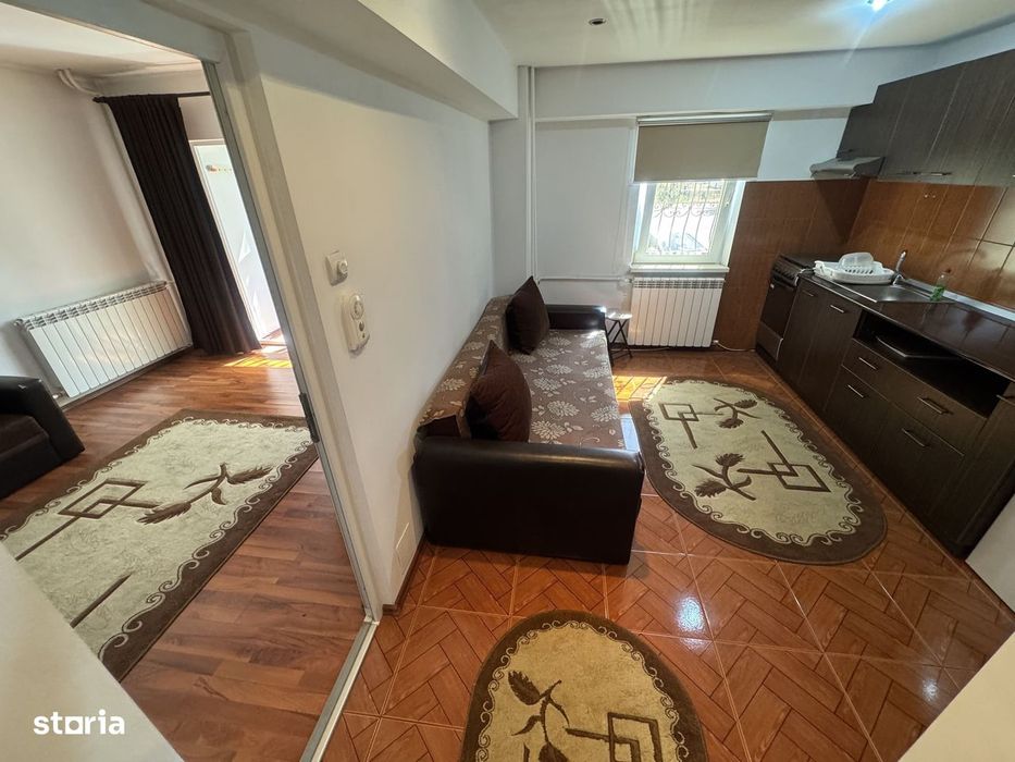 Apartament cu o cameră 40mp parter cu balcon zona Bratianu Scoala nr.