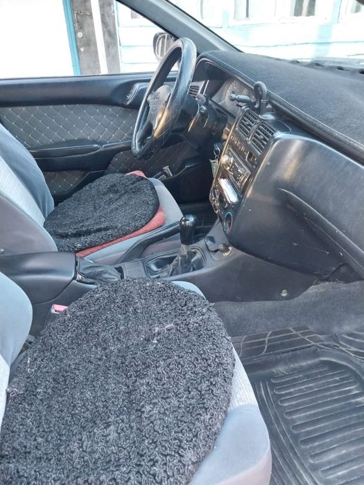 Продам машину Toyota Karina E