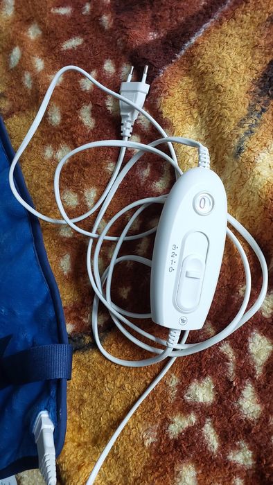 Продам электро грелка для спины шеи