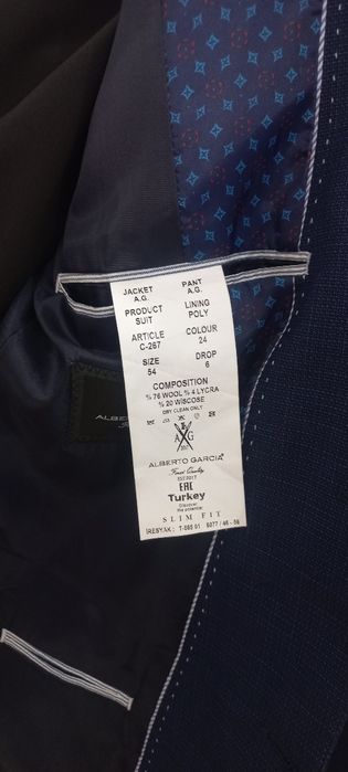 Костюм и брюки темно-синего цвета