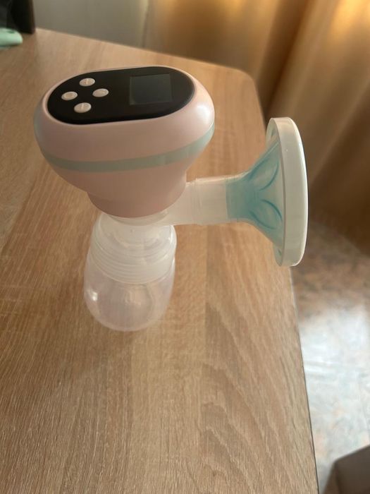 Продам электрический молокоотсос