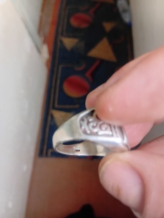 Печатка серребро с золотом.