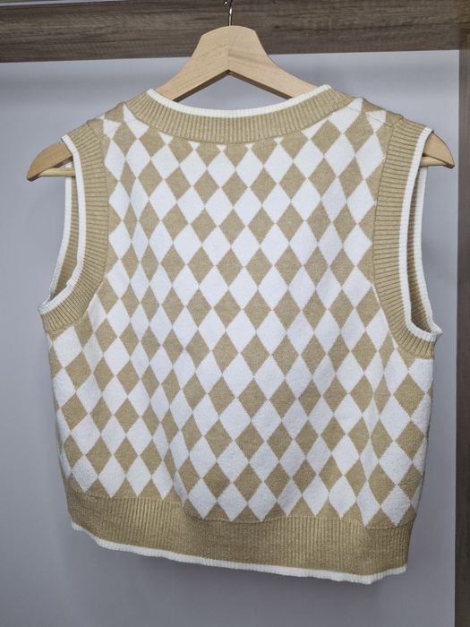 Продается женская жилетка