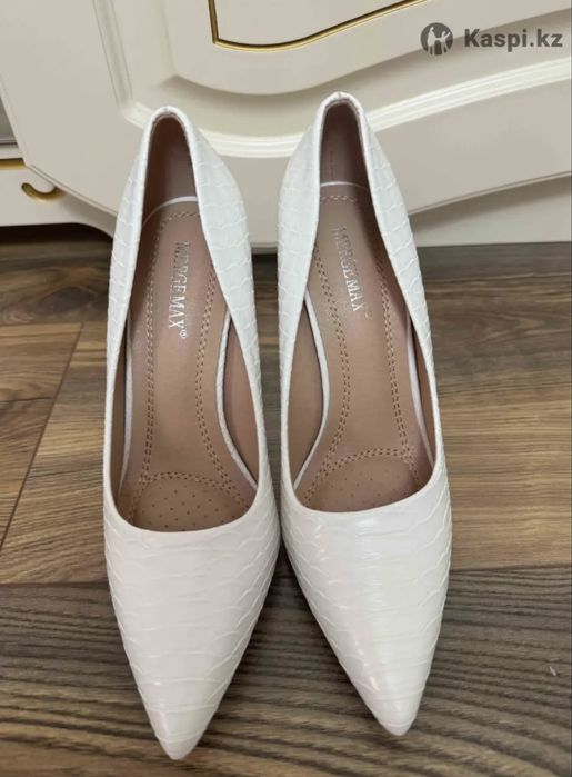 Продам новые туфли