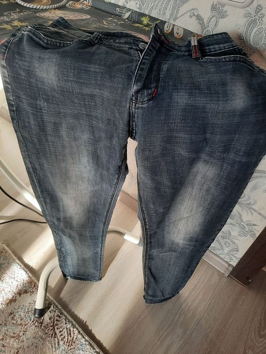 Продам мужские джинсовые брюки .