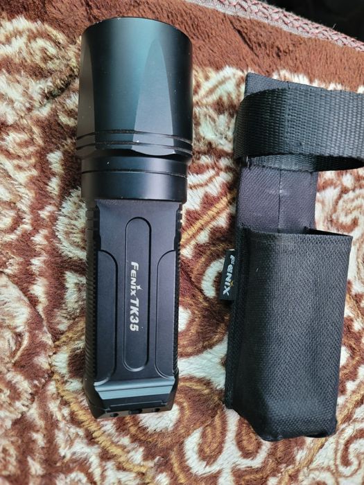 Fenix TK35 фонарь тактический
