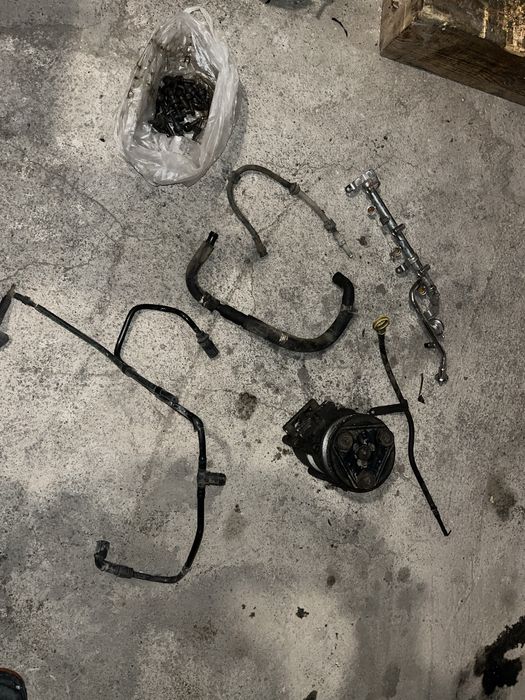 Запчасти на Мазда Трибут