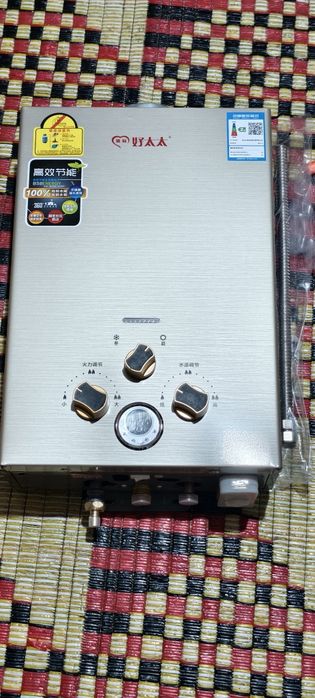 Продам новую газовую колонку срочно