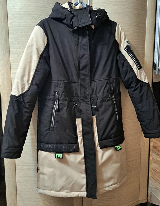 Продам женский пуховик