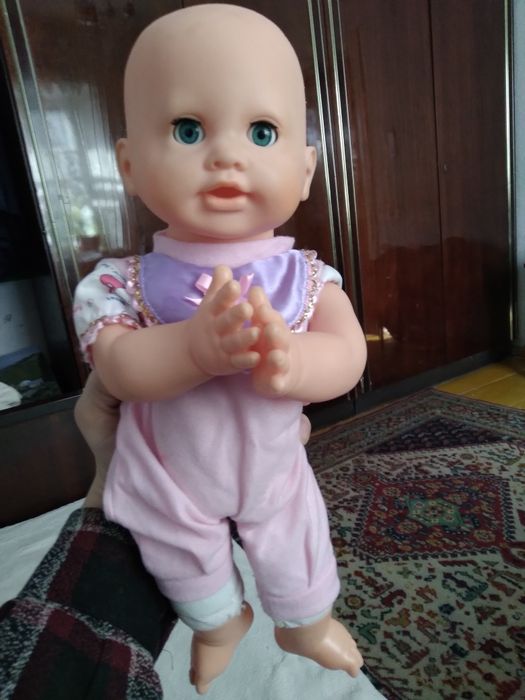 Кукла для детей говорящая паёт говорит