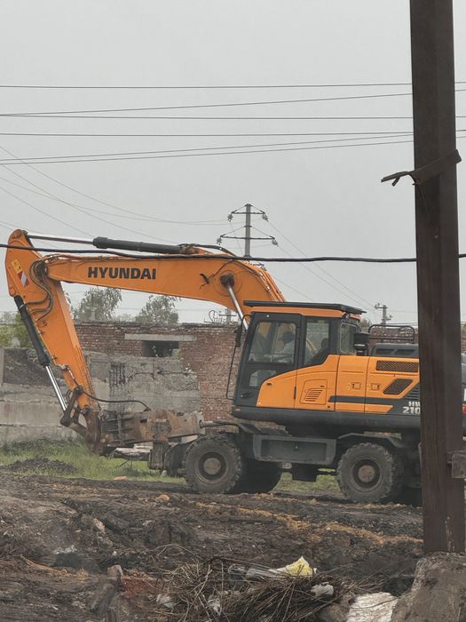 Услуги колесного экскаватора