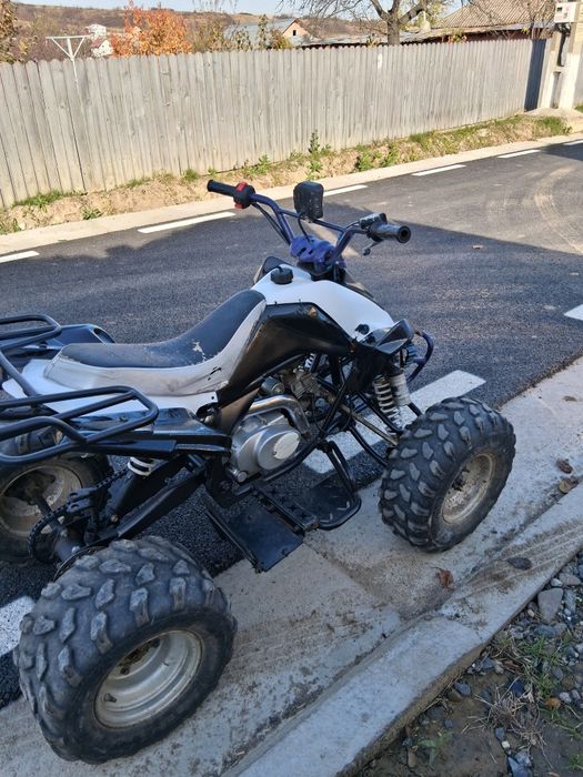 Vând atv 125cc 3+1