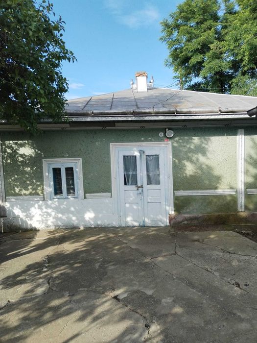 Casa batraneasca cu teren intravilan la drum national