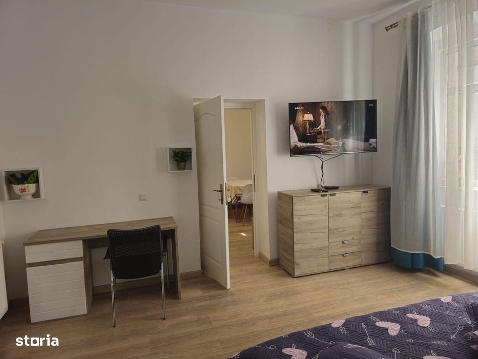 Casa finisata la curte comuna, 56 mp, 2 camere - zona Centrala
