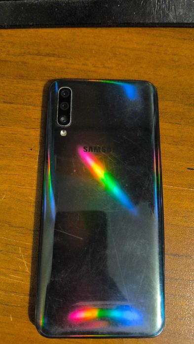 Телефони за части