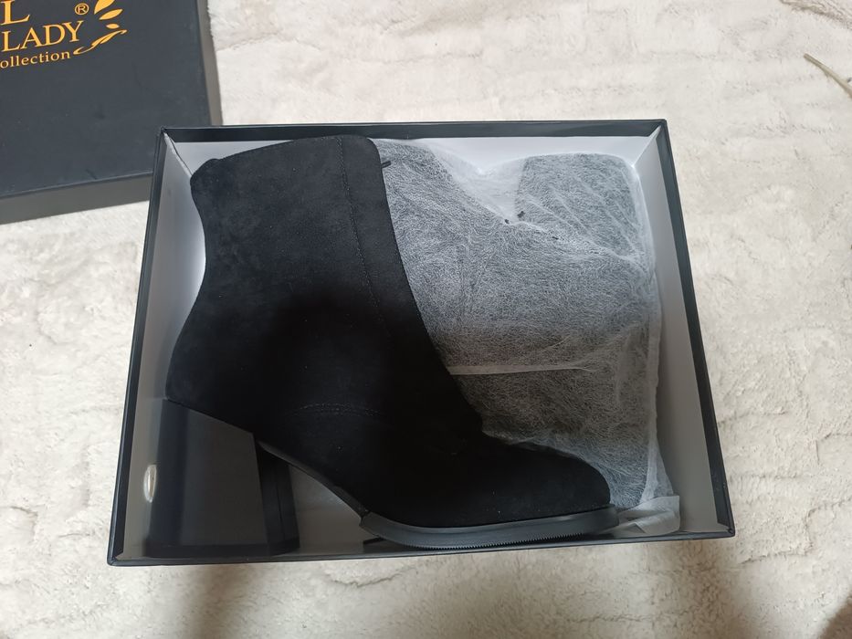 Зимние сапоги на каблуке