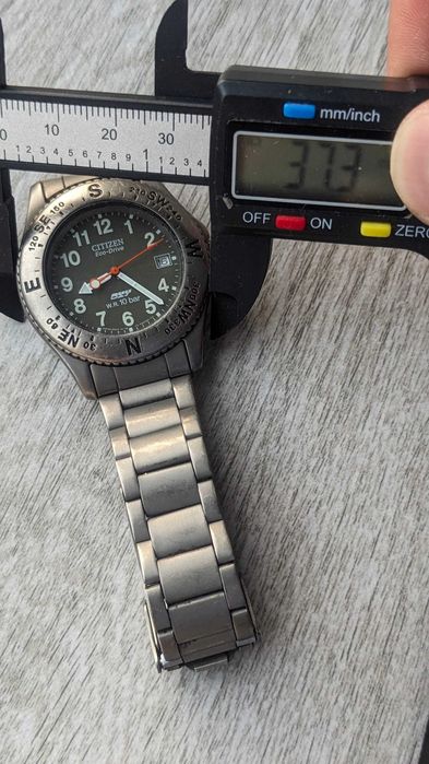 Ceas Citizen Oxy Eco-Drive Titanium diver bezel stil busola