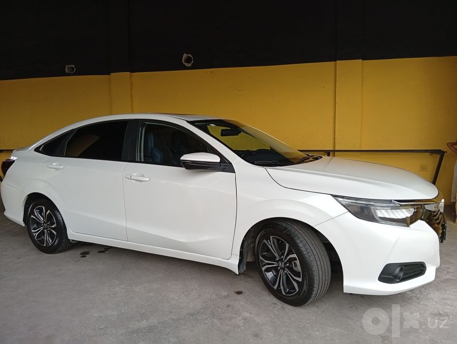 Авто мобил Honda crider