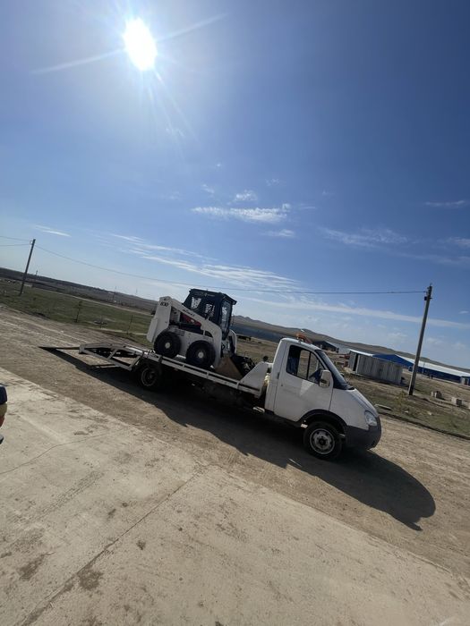 Услуги бобката, ямобур, погрузчик