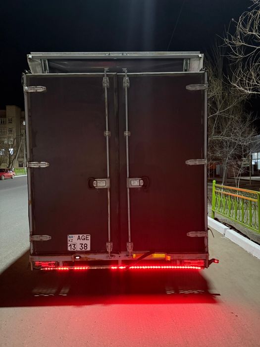 Прицеп эвакуатор тент