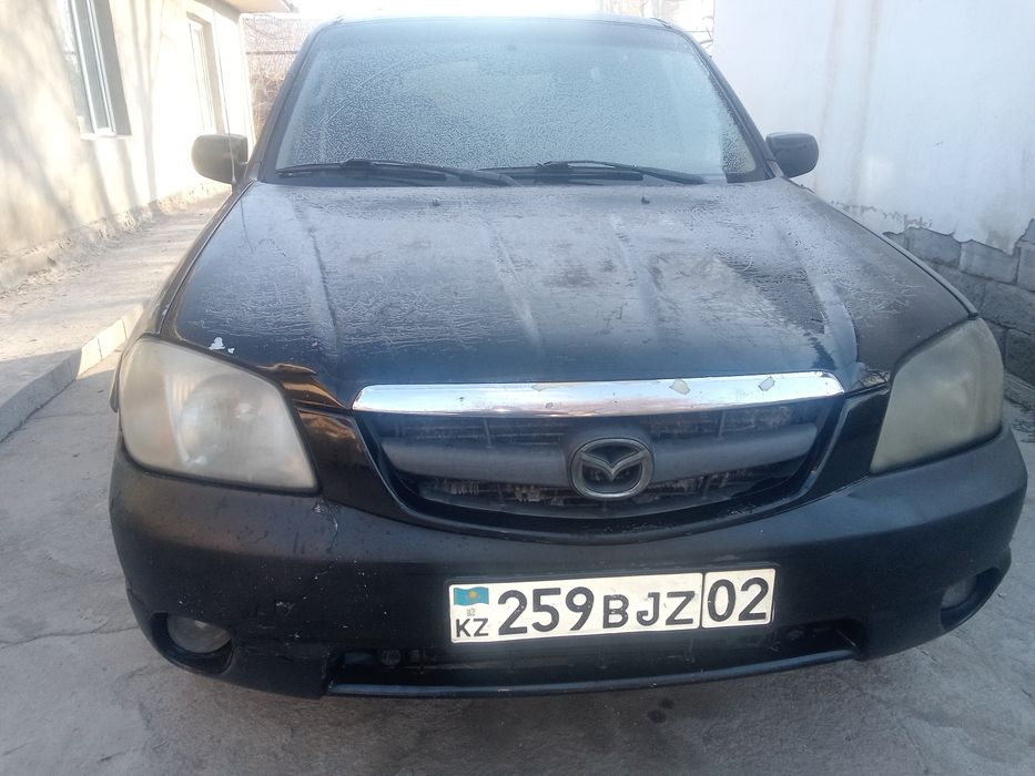Продам срочно Mazda Tribute