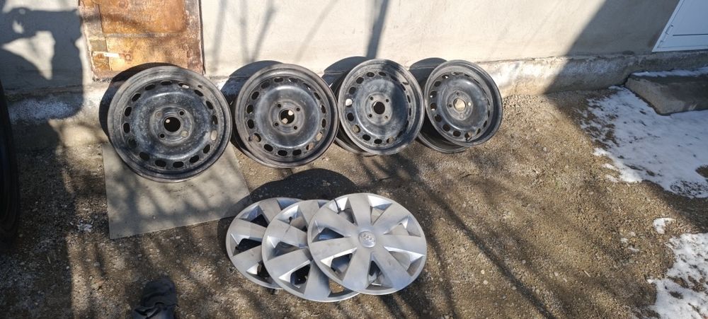 Темір дискалар калпактарымен