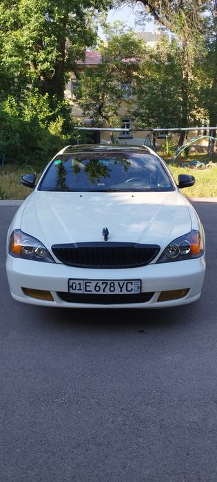 деу Магнус, год:2002