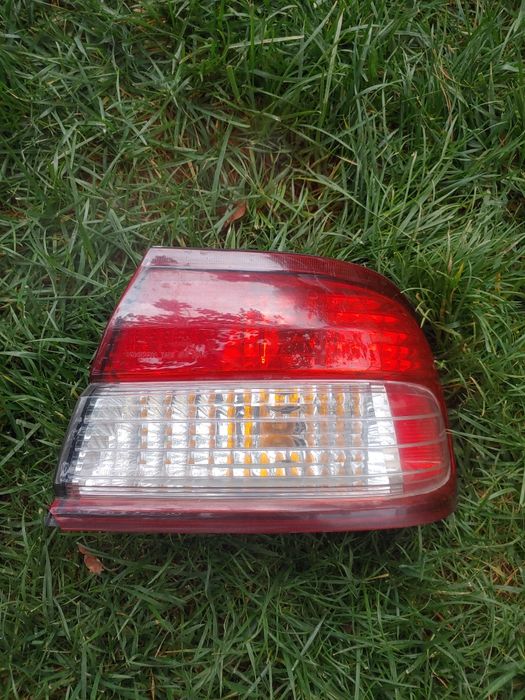 Nissan maxima правий задная фара 1996 года