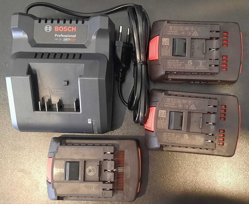 Комплект ново зарядно Bocsh GAL18V-20 и 3бр. батерии Bosch GBA18V-20 Li-Ion 2.0 Ah - 2 нови и една употребявана