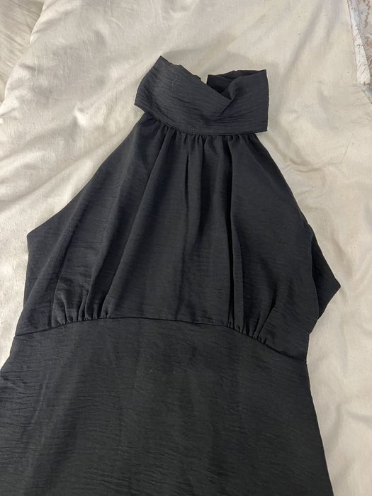 Рокля с трапецовидна яка