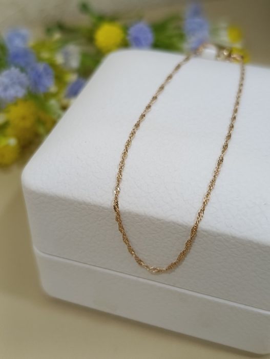 Yengi tilla braslet 585 proba