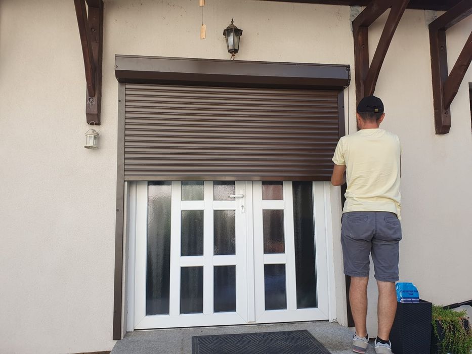 RULOURI Aluminiu si Usi de garaj rezidentiale SECTIONALE