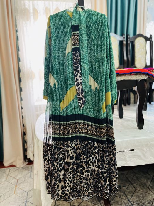 Одежда на выход .