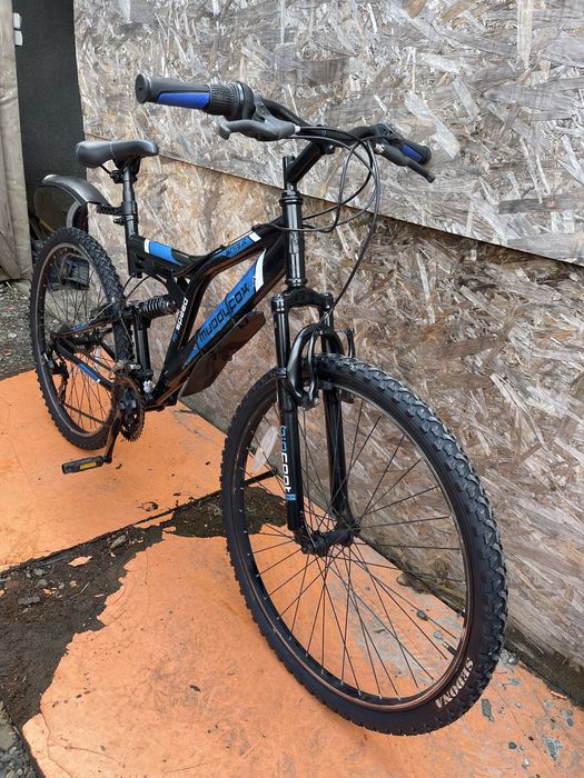 Bicicleta muddyfox roti 26” cu suspensii