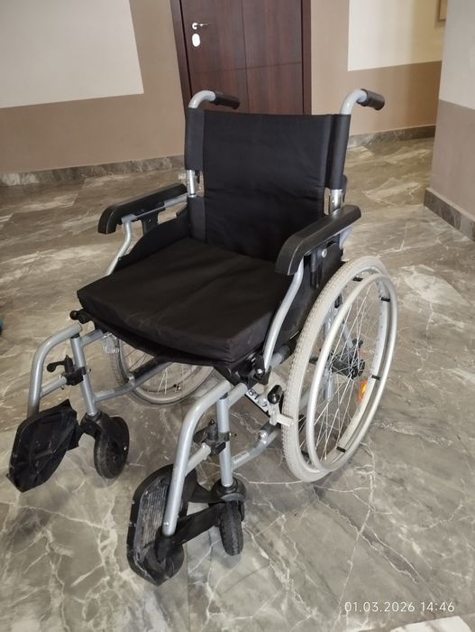 Инвалидная коляска