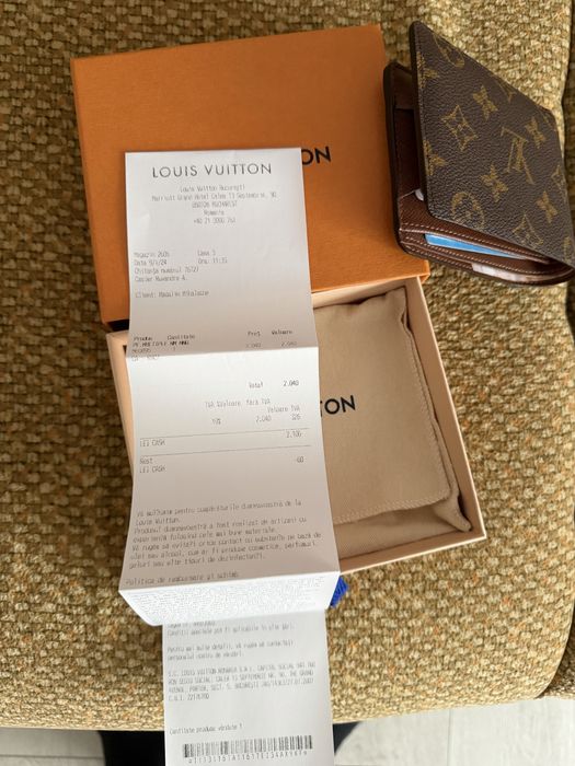 Vand portofel din gama de lux Louis Vuitton