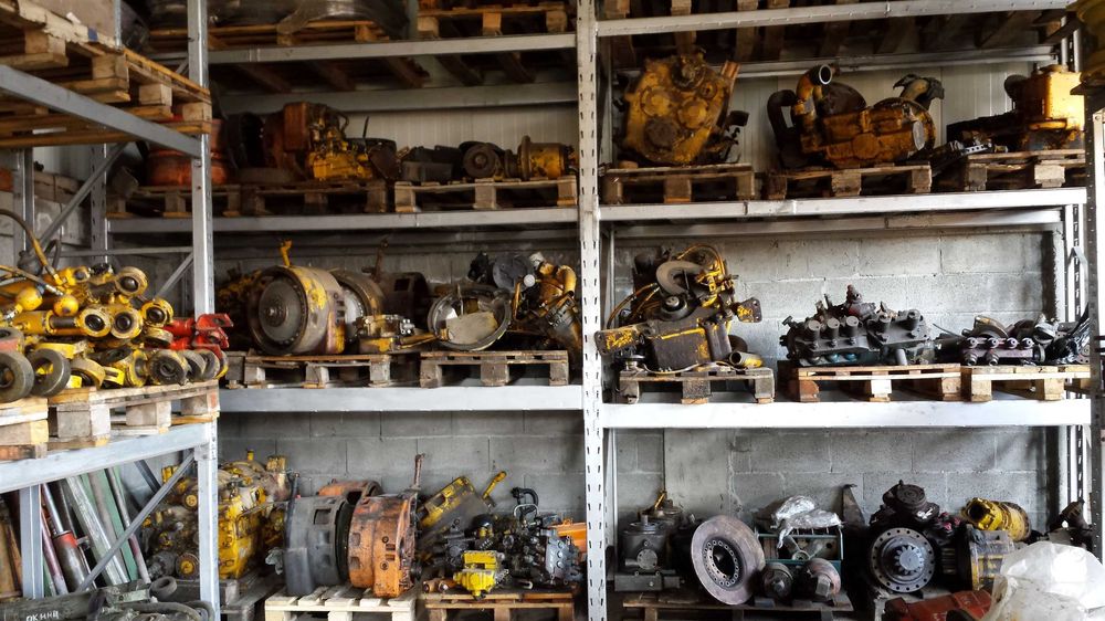 Piese incarcator frontal mare CAT Volvo Komatsu motor transmisie pompe hidraulice utilaje constructii