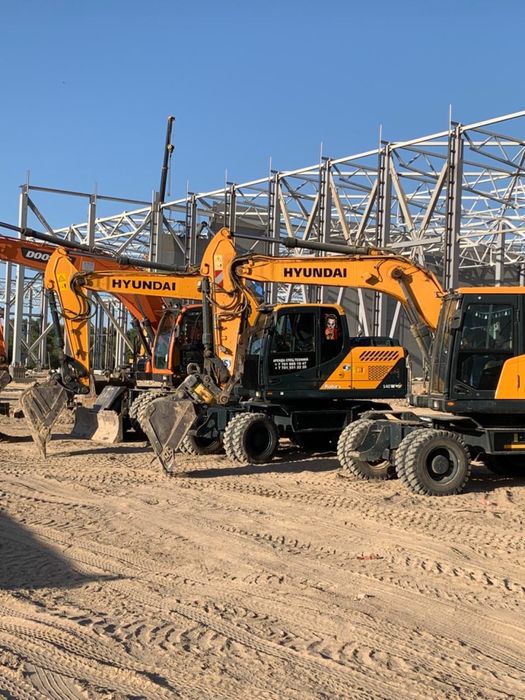 Колесный ЭКСКОВАТОР 210 и 140