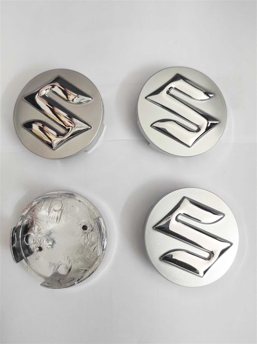 Капачки за джанти за Сузуки 54 мм и 58 мм. Цвят: сребристо и черно.