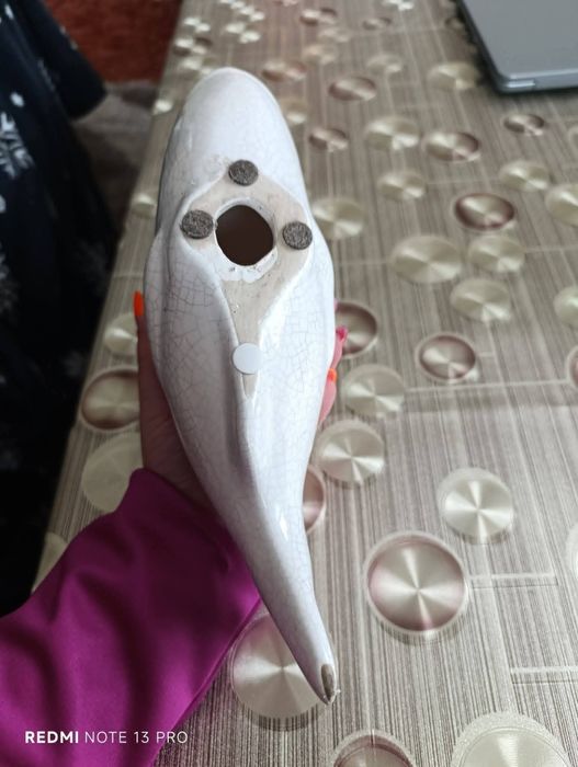 Стара статуетка на риба