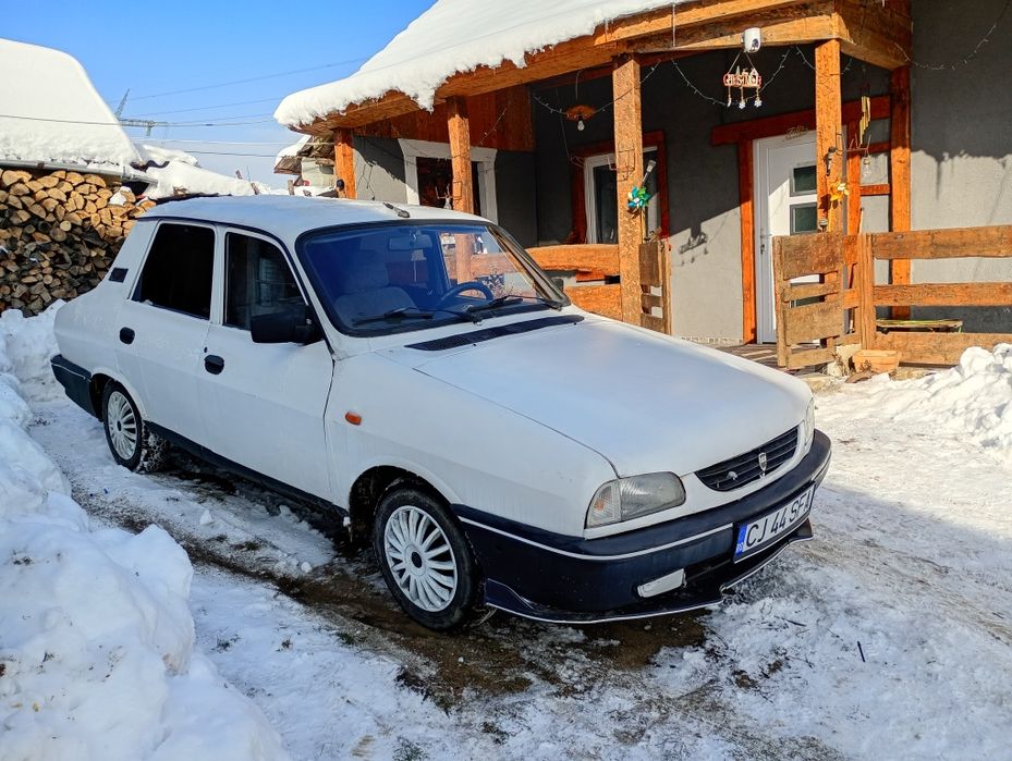 Vand Audi A4 B6 2002    si.  Dacia 1310 din 2004