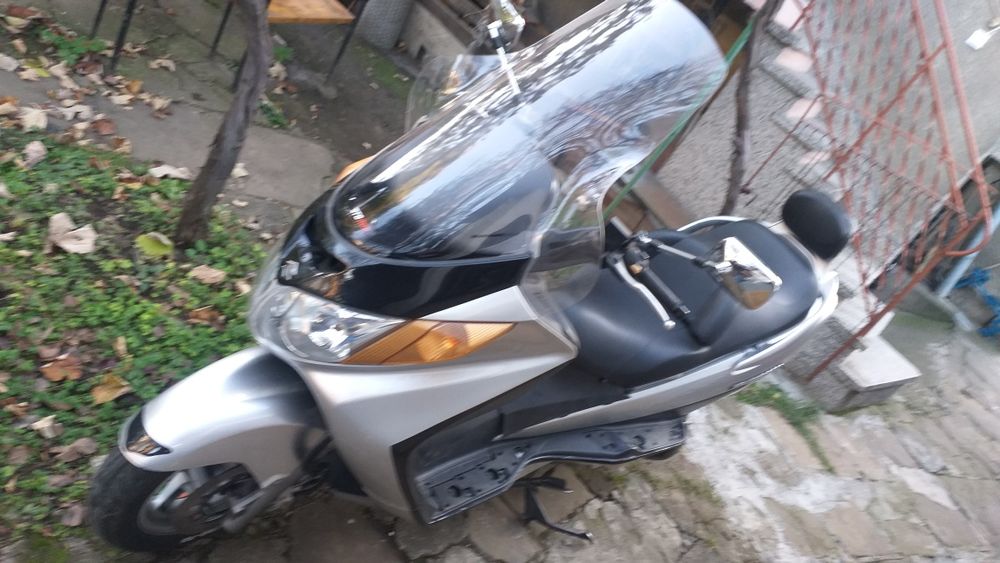 Suzuki Burgman 250,400 сузуки бъргман 250 мерцедесовия стоп 2000 год.