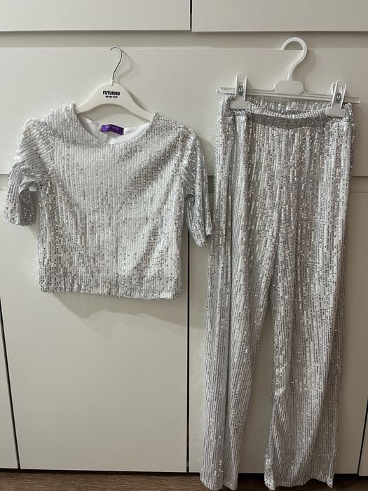 Одежда на девочек по 1000 тенге.