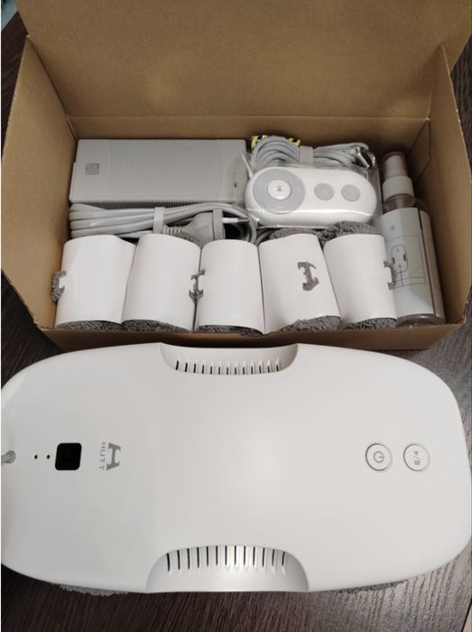 Робот-мойщик окон,зеркал,кафеля