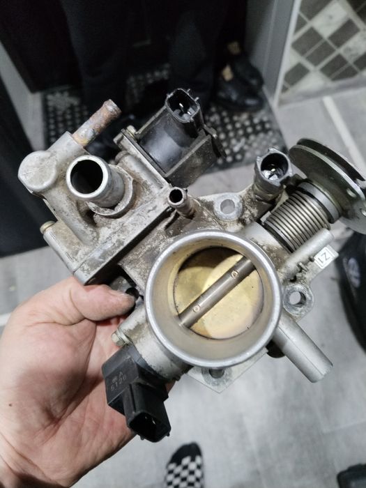 Дроссельная заслонка