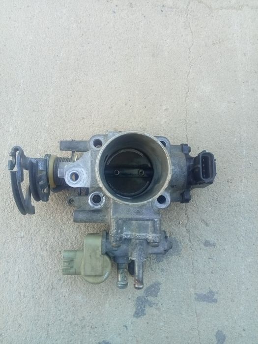 Продам дроссельный заслонка