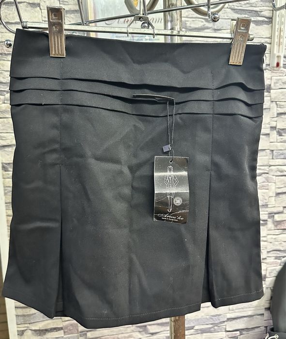 Новые черный, синие юбки