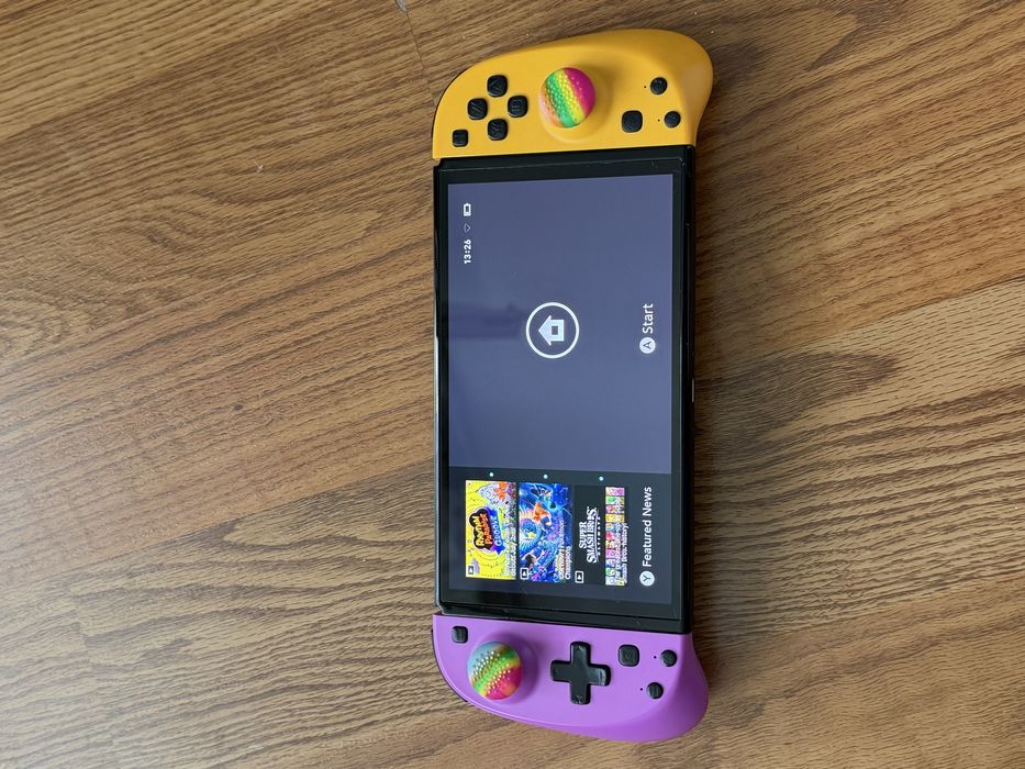 Nintendo Switch OLED + 9 jocuri + accesorii